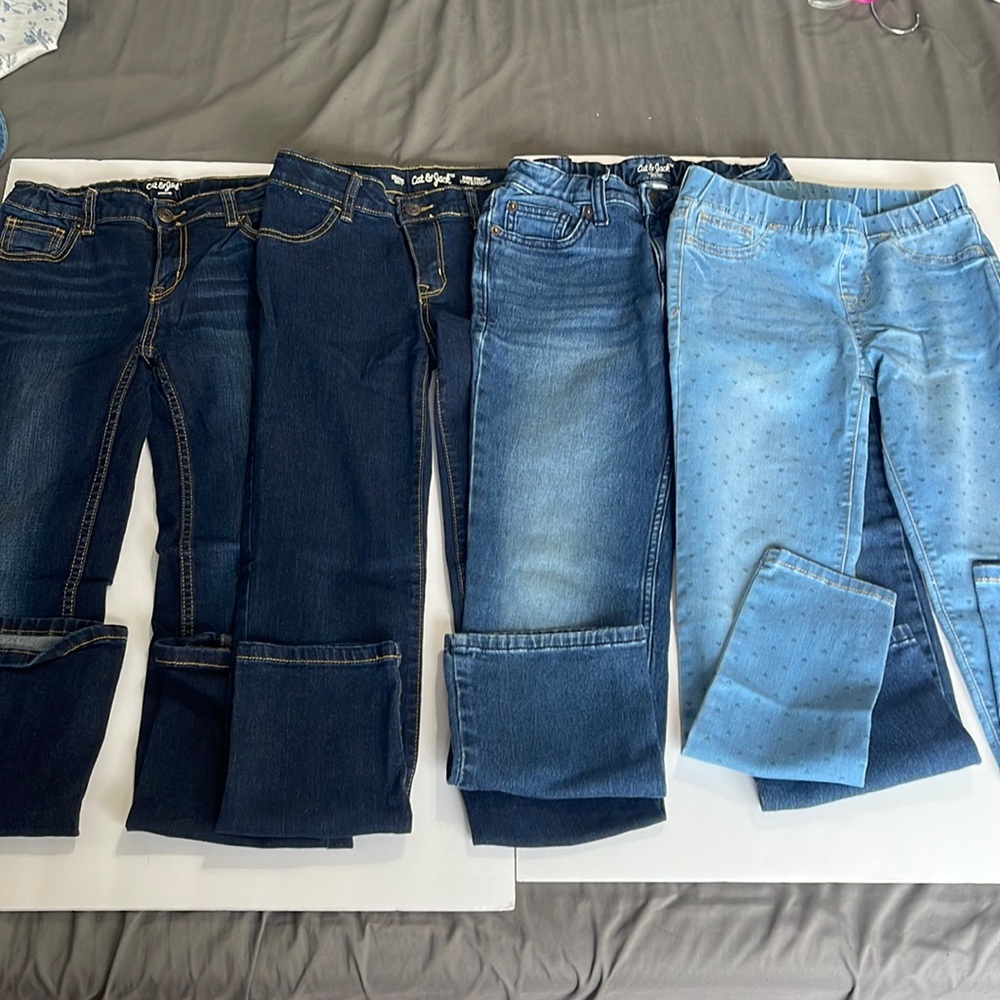 Size 10 girls. Cat & Jack. 2 nwot dark pair. 2 used great condition. Bundle